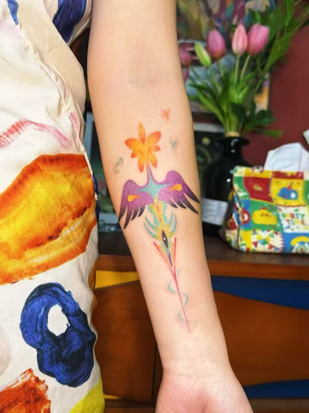 Color tattoo designed by Ying Yang on skin